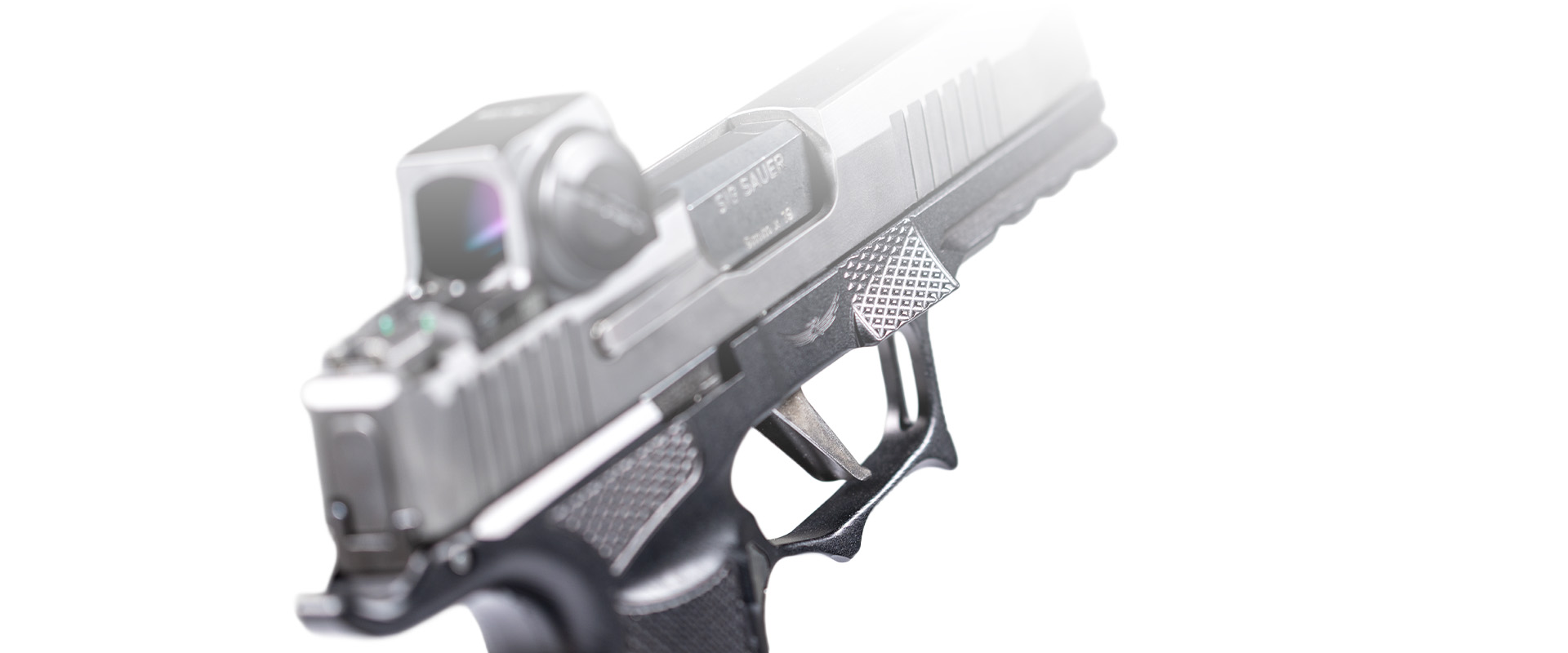 Front view of a handgun showing sight alignment detail